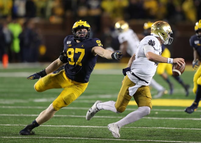 Michigan Wolverines football junior edge defender Aidan Hutchinson was able to participate in some drills during spring ball, after injuring his ankle last season.