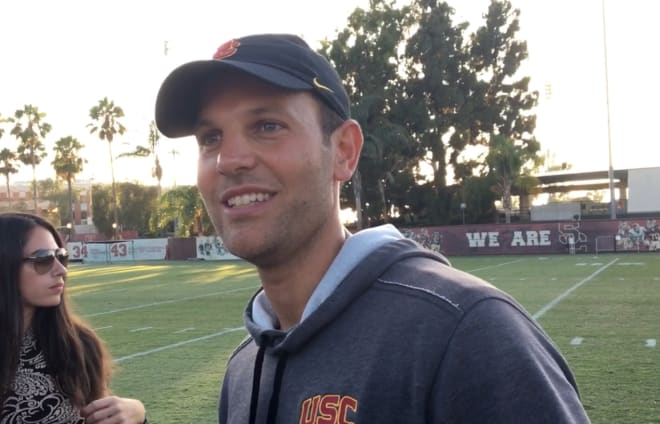 USC offensive coordinator Graham Harrell is hoping the offensive line can set the tone not just with its physicality but with its pace this season.