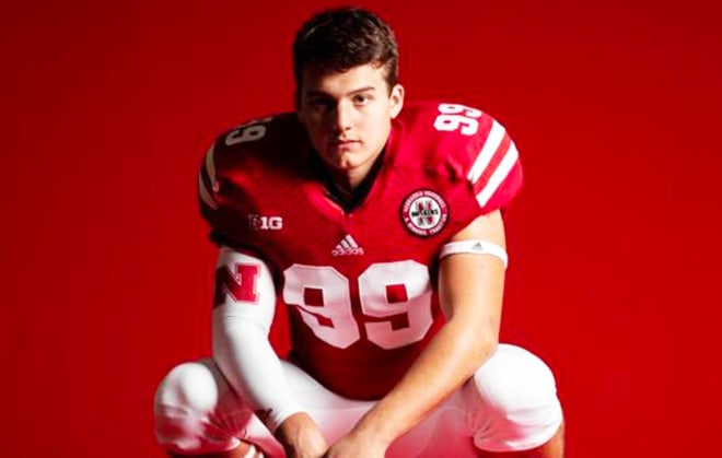 You ask Luke Lindenmeyer why he wears No. 99 and he tells you because it's different. "No other tight end wears 99." Which makes Luke one of a kind.