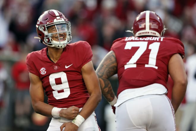 Alabama Crimson Tide quarterback Bryce Young (9) reacts after throwing a pass for a touchdown against the Arkansas Razorbacks during the first half at Bryant-Denny Stadium. Photo | Butch Dill-USA TODAY Sports