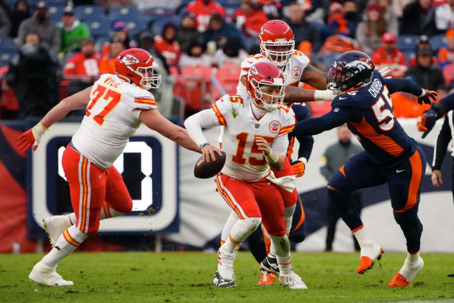 Denver Broncos strongside outside linebacker Bradley Chubb chases Kansas City Chiefs quarterback Patrick Mahomes.