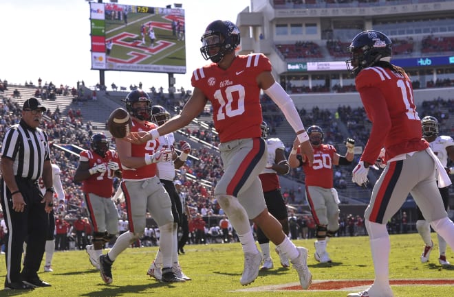 Ole Miss quarterback Jordan Ta'amu scores one of his two rushing touchdowns Saturday against ULL. 