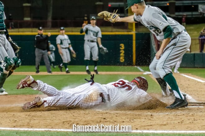 Jonah Bride slides home with the eventual game-winning run on Friday night