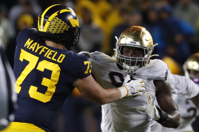 Michigan Wolverines football offensive lineman Jalen Mayfield started all 13 games in 2019.