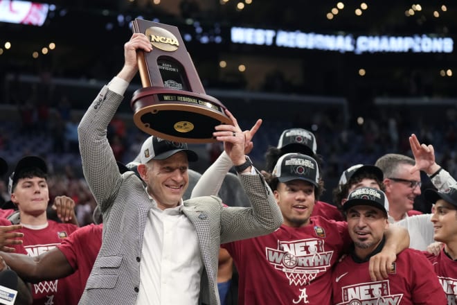 Alabama Crimson Tide head coach Nate Oats celebrates with the trophy after defeating the Clemson Tigers in the finals of the West Regional of the 2024 NCAA Tournament at Crypto.com Arena. Photo | Kirby Lee-USA TODAY Sports