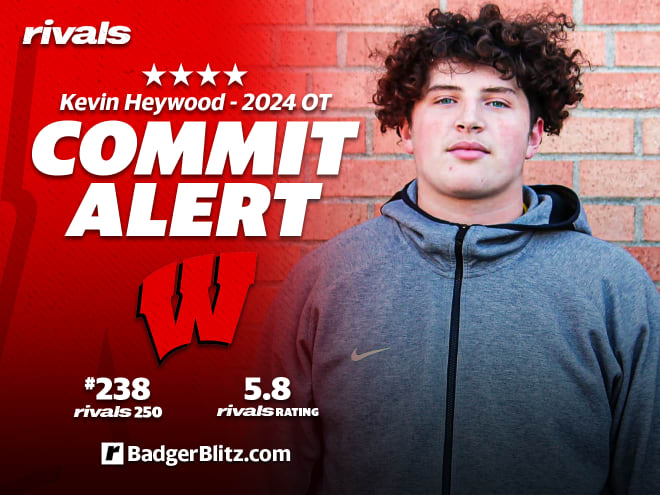 Four-star offensive tackle Kevin Heywood announced his commitment to Wisconsin on Tuesday. 