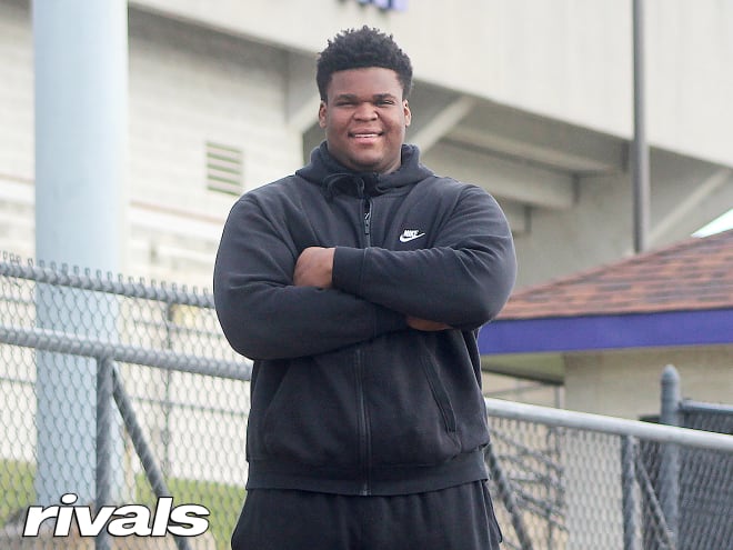 Indiana defensive tackle Kenneth Grant holds a Michigan Wolverines football recruiting offer from Jim Harbaugh.