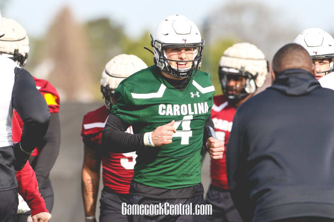 South Carolina quarterback Luke Doty jogs onto the field at a Gamecocks' practice this spring.
