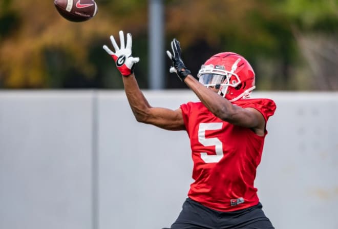 RaRa Thomas stretches for a ball during Thursday's practice.