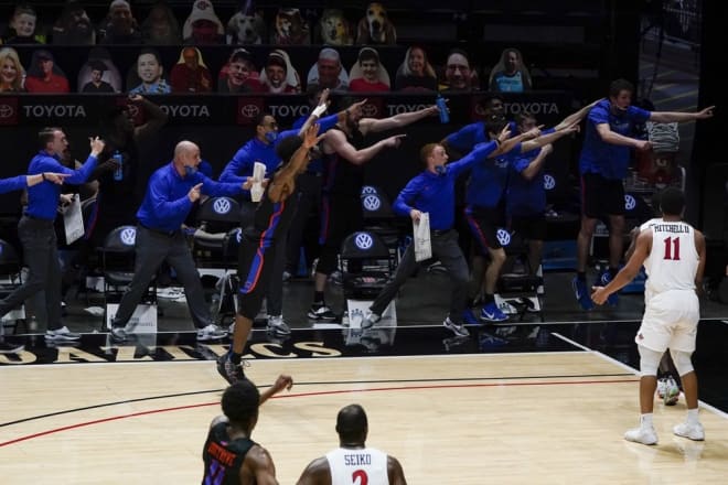 Boise State players and coaches signal that they had possession of the ball during the second half of an NCAA college basketball game against San Diego State, Thursday, Feb. 25, 2021, in San Diego. (AP Photo/Gregory Bull