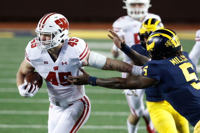 Michigan Wolverines Football quarterback Joe Milton struggled in a loss to Wisconsin and was replaced by Cade McNamara.