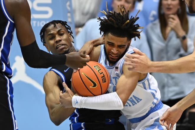 Duke's Jeremy Roach, left, and UNC's RJ Davis battle for the ball during last season's meeting in Chapel Hill. 