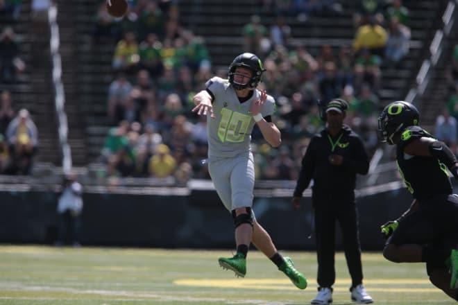 Justin Herbert throws a football with an ease and an athletic ability that makes NFL scouts drool. But is he ready to elevate an underdog team in a big game?