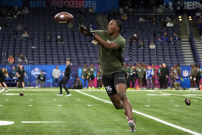 Former Notre Dame cornerback Cam Hart runs takes part in position drills Friday during the NFL Combine at Lucas Oil Stadium in  Indianapolis.