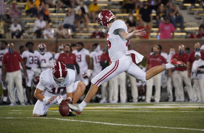 Alabama Crimson Tide place kicker Will Reichard (16) kicks a point after touchdown against the Missouri Tigers during the first half at Faurot Field at Memorial Stadium. Photo | Imagn