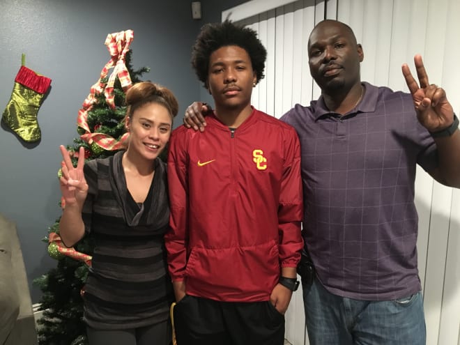 Max Williams with his mother, Shante Williams, and his father, Maxzell Williams Sr., shortly after Christmas.