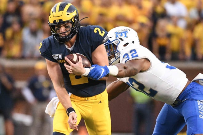 Michigan quarterback Shea Patterson threw for 197 yards and three scores in the first half Saturday. 