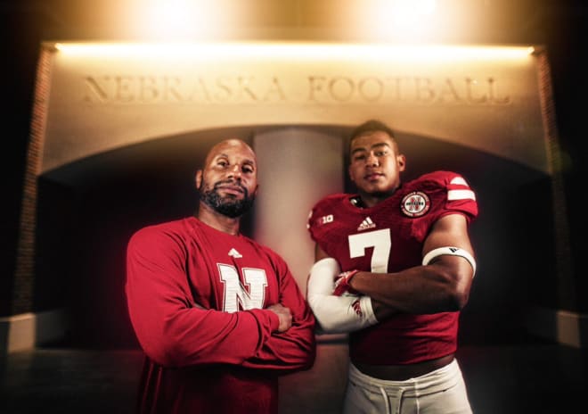 NU receivers coach Troy Walters with William Nixon during his visit to Nebraska.