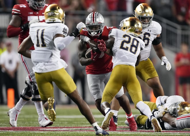 Ohio State's Miyan Williams runs the ball against Notre Dame in the Buckeyes' 21-10 victory on Sept. 3, 2022 in Columbus, Hio.