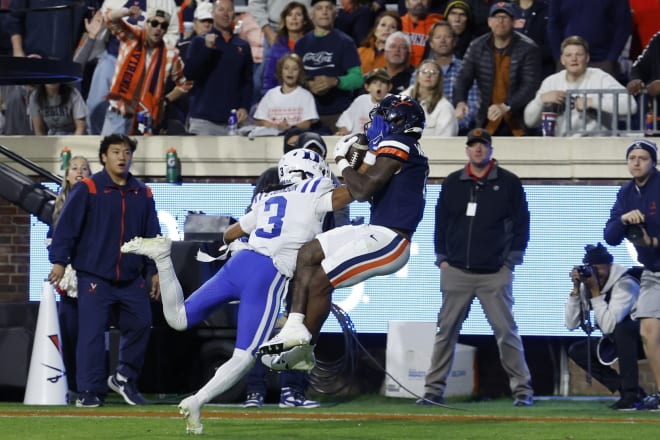 Virginia's Malik Washington, right, catches a touchdown in front of Duke's Brandon Johnson. 