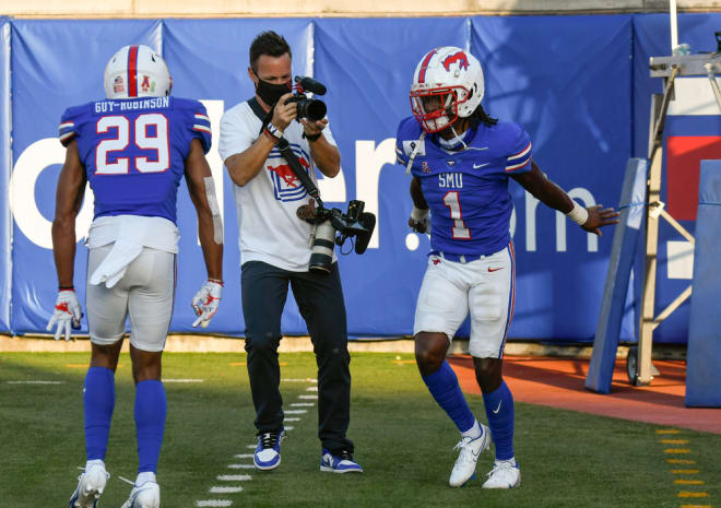 Brandon Crossley (right) celebrates with Justin Guy-Robinson after the Memphis game.