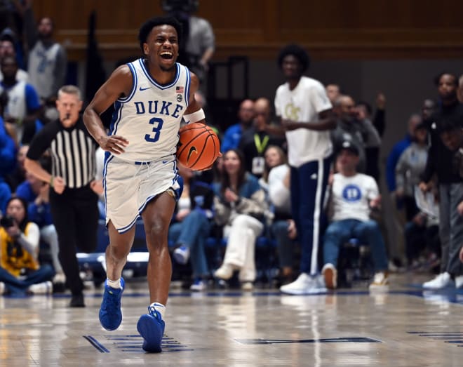 Duke's Jeremy Roach grimaces as he brings the ball up the court. 