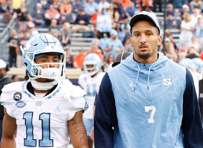 Injured UNC jack Noah Taylor (right) gave the Tar Heels a pre-game speech Saturday on his birthday. 