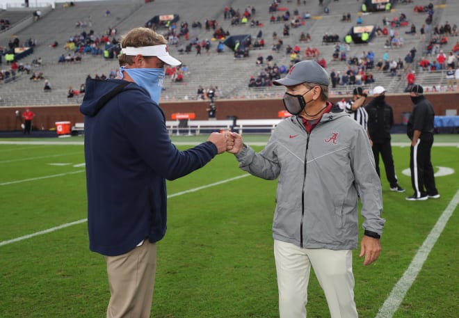 Ole Miss head coach Lane Kiffin (left) and Alabama head coach Nick Saban (right) greet each other before last season's game. Photo | USA Today