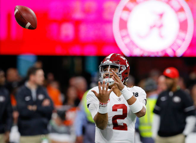Alabama quarterback Jalen Hurts catches a ball during warmups before the national championship game. Photo | Getty Images 