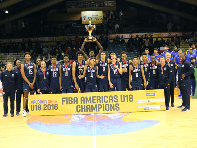 Smart, Allen (13), Banks (15), and Bamba (trophy) celebrating U18 FIBA Americas Championship.