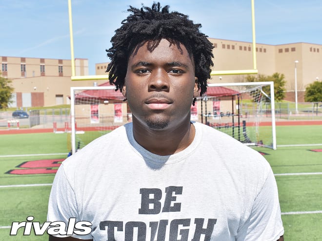 Mansfield Legacy DE David Abiara signed with Texas on Wednesday morning. 