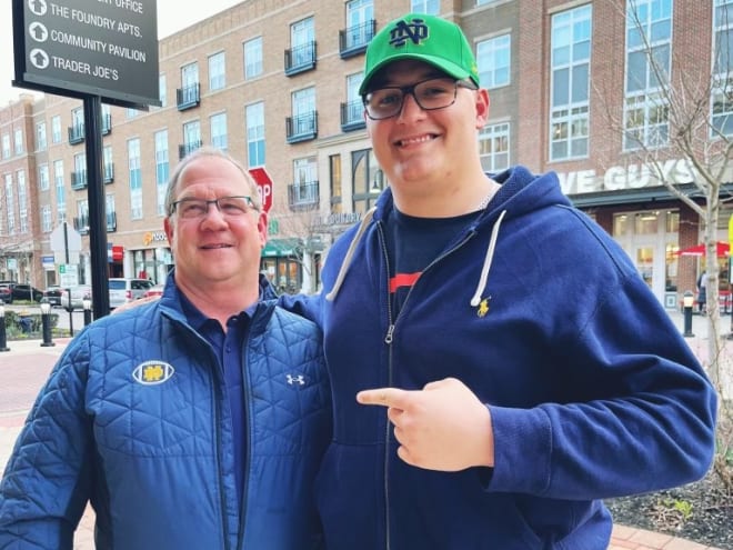 Then-Irish offensive line coach Harry Hiestand with offensive guard Sam Pendleton on a recruiting visit last spring.