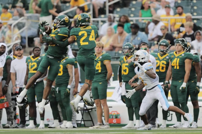 Carl Williams intercepts a pass in Baylor's 30-7 win over Long Island