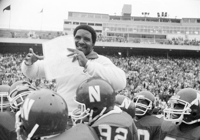 Northwestern players carry coach Dennis Green off the field after beating Northern Illinois.