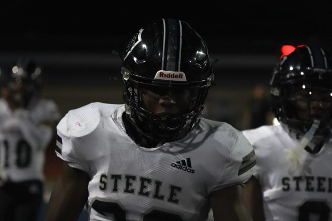 Hatton trots back to the sideline after a touchdown run