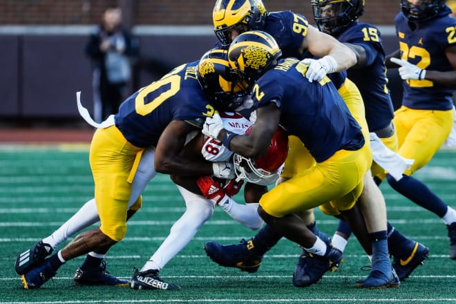 Michigan Wolverines football defensive backs Daxton Hill and Brad Hawkins