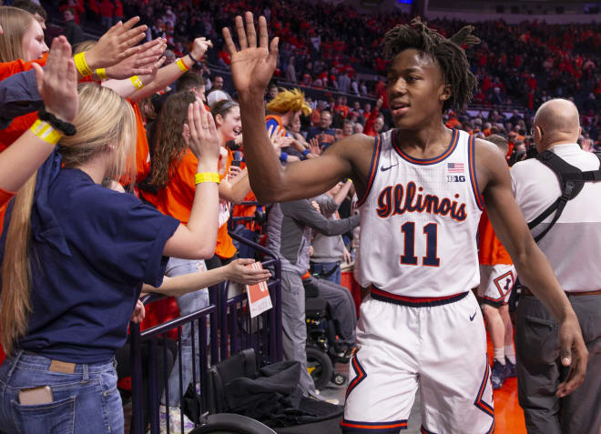 Ayo Dosunmu #11 of the Illinois Fighting Illini celebrates with fans after the game against the Indiana Hoosiers at State Farm Center on March 1, 2020 in Champaign, Illinois.