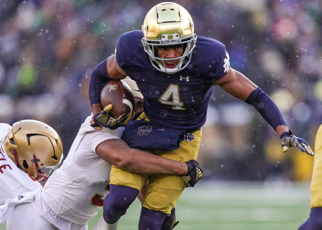 Notre Dame wide receiver Lorenzo Styles (4) tries to break a tackle during ND's 44-0 romp over Boston College last Saturday.