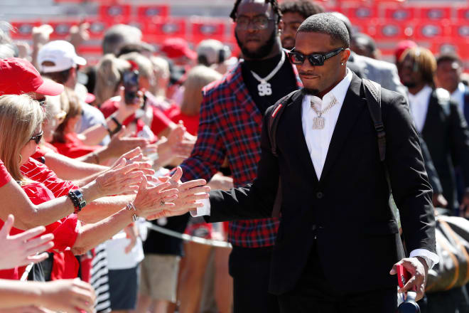 Georgia wide receiver Tyler Williams (10) slaps hands with fans during the Dawg Walk before the start of a NCAA college football game against Tennessee Martin in Athens, Ga., on Saturday, Sept. 2, 2023. Photo | Joshua L. Jones / USA TODAY NETWORK