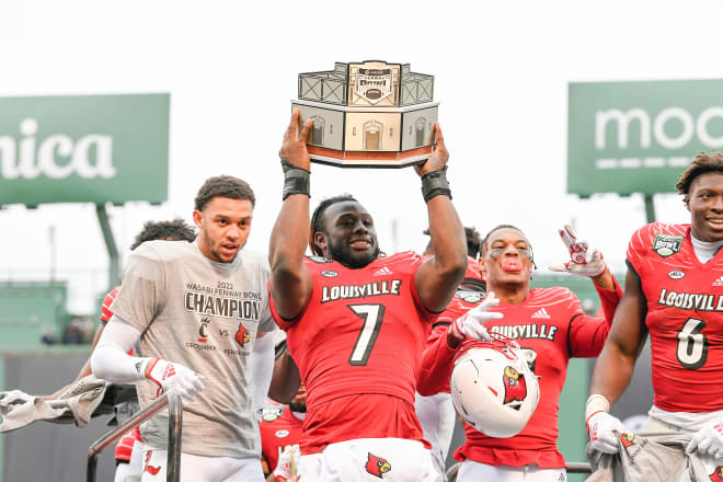 Louisville Cardinals linebacker Monty Montgomery (7) celebrates winning the Wasabi Bowl at Fenway Park. Photo | Eric Canha-USA TODAY Sports