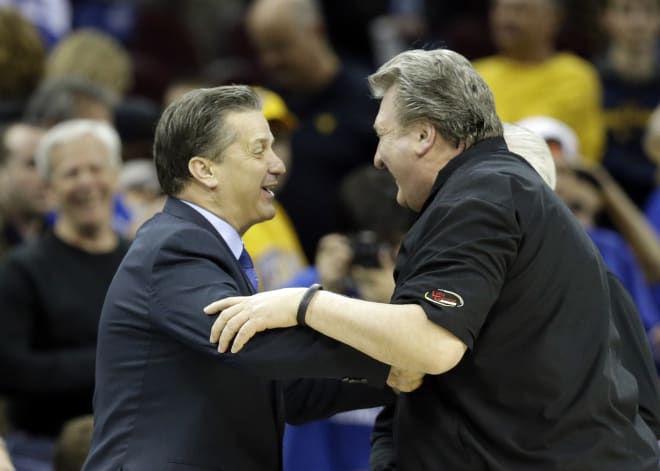 Huggins and Calipari will meet for the 12th time on Saturday. 