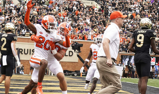 Clemson cornerback Nate Wiggins celebrates a game-winning batted pass in double overtime Saturday in Winston-Salem, as the Tigers escaped with a crucial division victory over No. 16 Wake Forest.