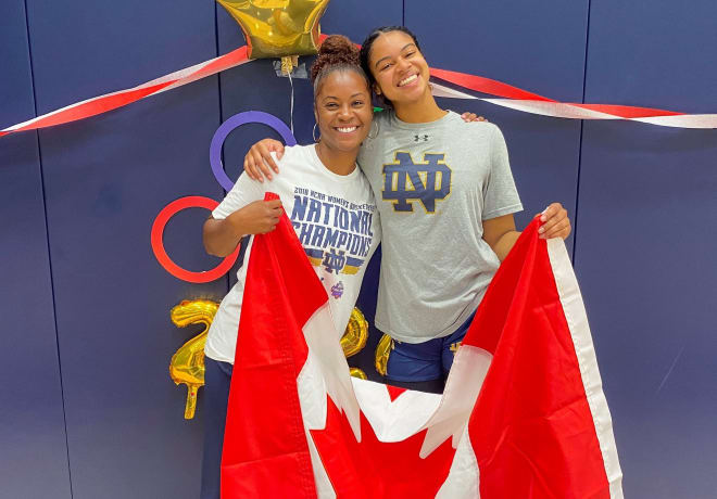 Notre Dame head coach Niele Ivey and Cass Prosper celebrate the Irish guard's being named to Team Canada's Olympic women's basketball team.