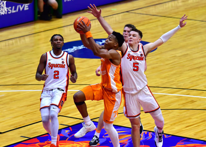 Nov 20, 2023; Honolulu, Hawaii, USA; Tennessee Volunteers guard Jordan Gainey (2) drives to the basket defended by Syracuse Orange guard JJ Starling (2) and guard Justin Taylor (5) during the first period at SimpliFi Arena at Stan Sheriff Center.