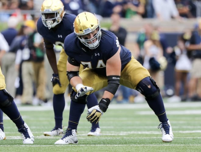 Left tackle Liam Eichenberg and his cohorts are adjusting to some new blocking schemes.
