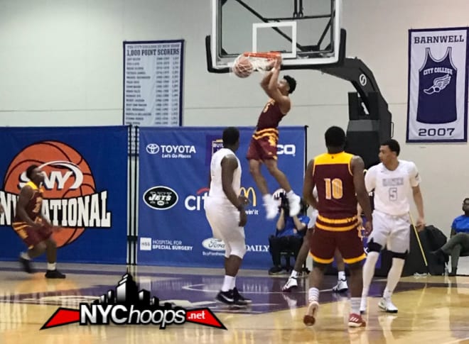 Tyrese Williams goes up for the dunk