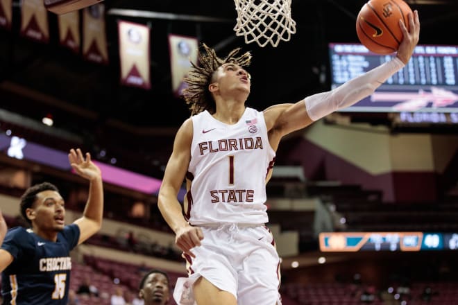 Florida State freshman guard Jalen Warley soars in for a reverse layup Thursday night in an exhibition victory over Mississippi College.