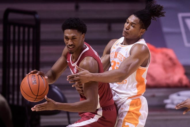 Tennessee guard/forward Yves Pons (35) runs into Alabama forward Jordan Bruner (2) during a game at Thompson-Boling Arena in Knoxville, Tenn. Photo | Imagn