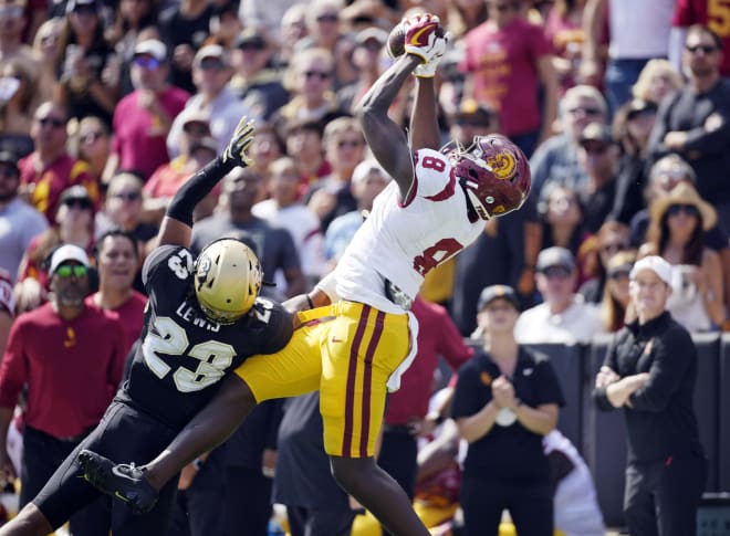 Freshman tight end Michael Trigg hauls in what would end up as a 46-yard touchdown reception last week at Colorado.