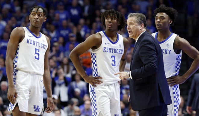 John Calipari spoke with his three-guard lineup during a break in the action against Auburn on Saturday.